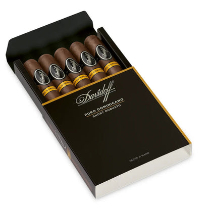 Open box of Davidoff cigars on a white background